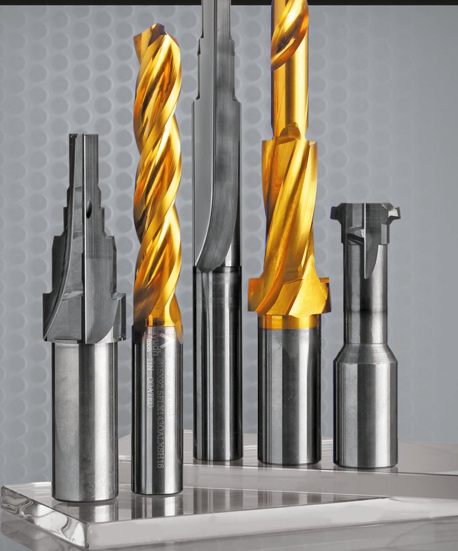 Group of solid carbide cutting tools including coated step drills and a form cutter.